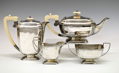 Lot 100 - George V silver four piece teaset in the Art Deco style