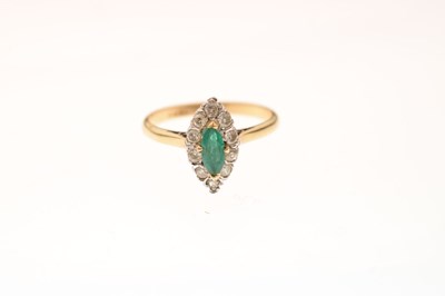Lot 40 - Emerald and diamond 18ct gold cluster ring