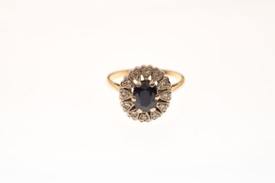 Lot 39 - Sapphire and diamond cluster ring