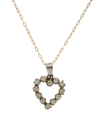 Lot 87 - Diamond set 18ct white gold heart-shaped pendant