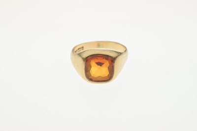 Lot 42 - 9ct gold ring set an orange-coloured faceted cushion-shaped stone