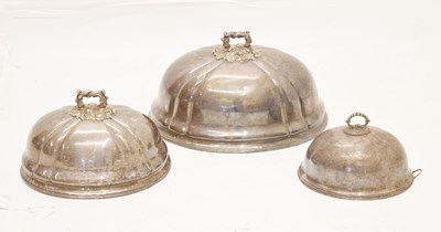 Lot 397 - Three silver plated meat covers