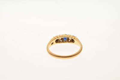 Lot 37 - Sapphire and diamond 18ct gold boat head ring