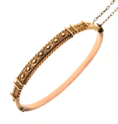 Lot 110 - Late 19th century 9ct rose gold hinged bangle