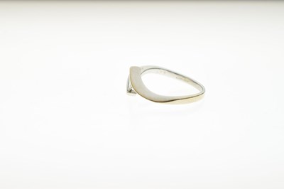 Lot 8 - 18ct white gold invisible set princess cut diamond ring