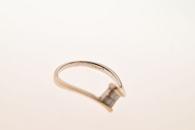Lot 8 - 18ct white gold invisible set princess cut diamond ring