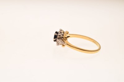 Lot 44 - Sapphire and diamond illusion set cluster ring