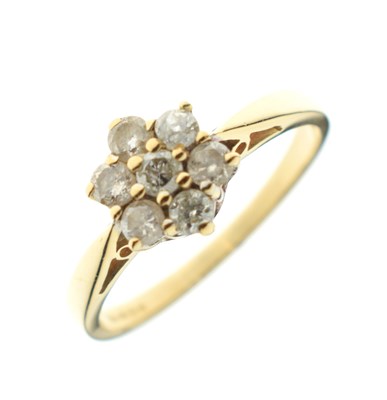 Lot 11 - 18ct gold diamond flower head cluster ring