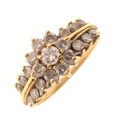 Lot 19 - 18ct gold flower head diamond cluster ring