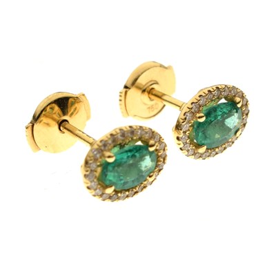 Lot 188 - Pair of emerald and diamond  cluster 18ct gold earrings