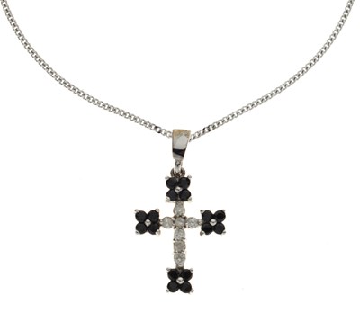 Lot 144 - 9ct white gold diamond set cross pendant