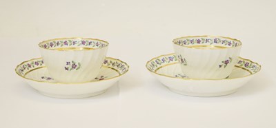 Lot 477 - Pair of late 18th century New Hall-style spirally-fluted tea bowls and saucers