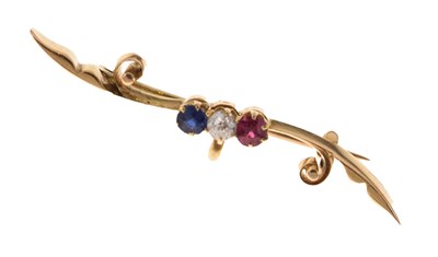 Lot 105 - Ruby, sapphire and diamond yellow metal bar brooch