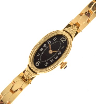 Lot 242 - Lady's yellow metal stamped 585 bracelet watch