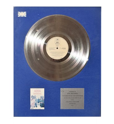 Lot 443 - Abba 'Waterloo' platinum disc, 1976, together with a photographic print