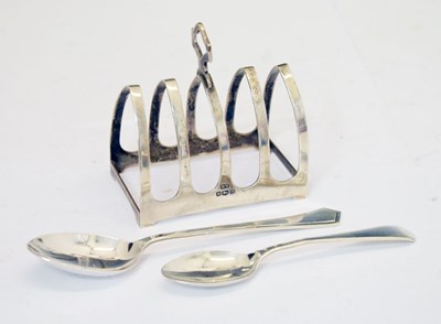 Lot 281 - Elizabeth II silver toast rack, together with two silver teaspoons