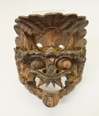 Lot 588 - South East Asian carved wooden dragon mask