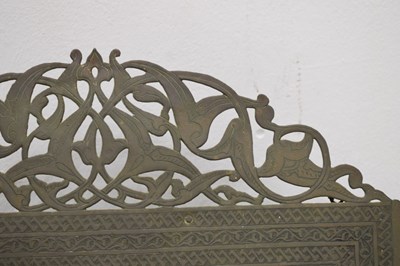 Lot 376 - Unusual antique brass Islamic script wall mirror