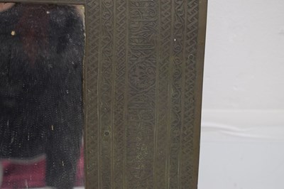 Lot 376 - Unusual antique brass Islamic script wall mirror