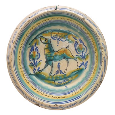 Lot 316 - Large Continental faience bowl decorated with a dog