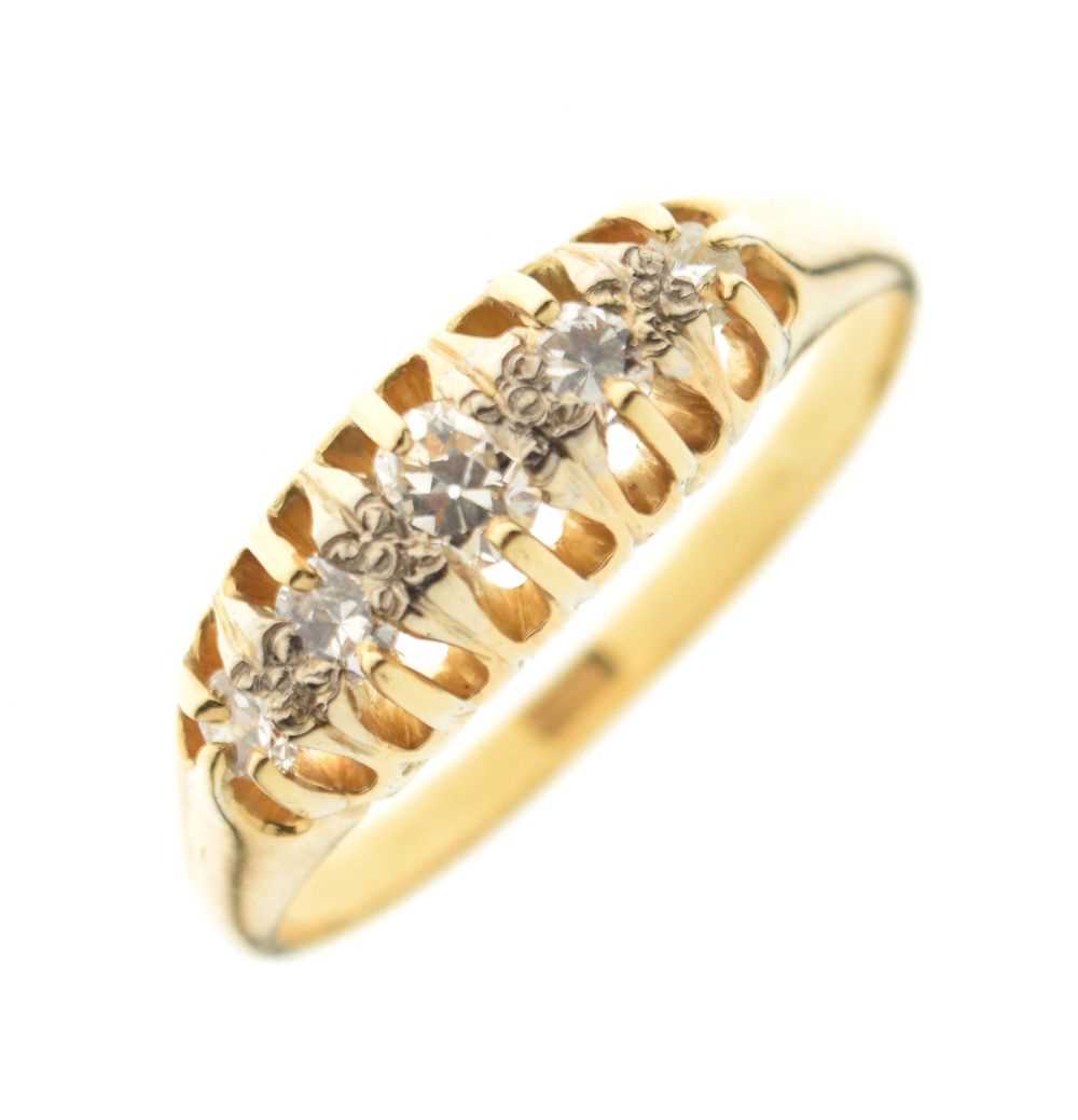 Lot 26 - Yellow metal '15ct' five-stone diamond ring