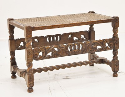 Lot 705 - Carved cane-seat stool/luggage rack