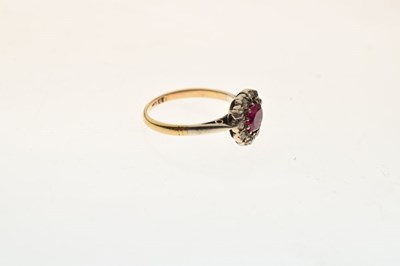 Lot 39 - Yellow metal cluster ring set ruby and diamonds