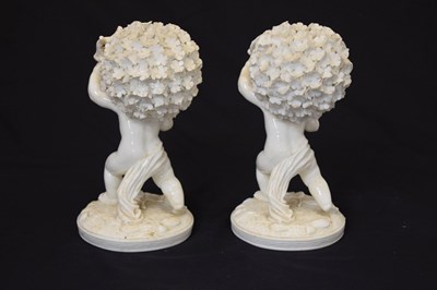 Lot 528 - Pair of late 19th century Moore Brothers porcelain figures of cherubs