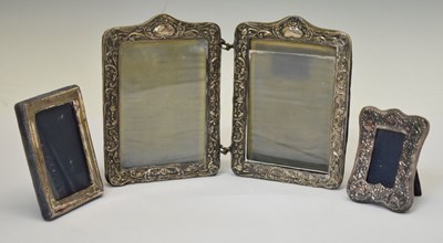 Lot 295 - Edward VII silver mounted hinged photo frame, and two smaller silver mounted easel photo frames