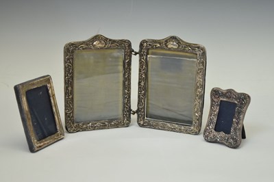 Lot 295 - Edward VII silver mounted hinged photo frame, and two smaller silver mounted easel photo frames