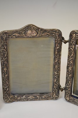 Lot 295 - Edward VII silver mounted hinged photo frame, and two smaller silver mounted easel photo frames