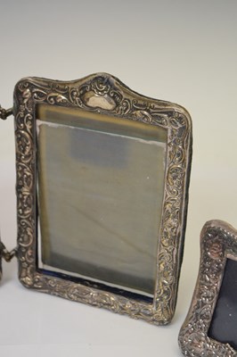 Lot 295 - Edward VII silver mounted hinged photo frame, and two smaller silver mounted easel photo frames