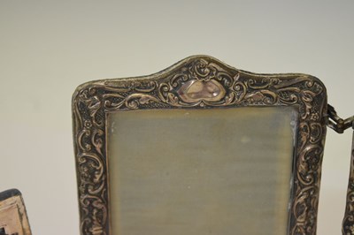 Lot 295 - Edward VII silver mounted hinged photo frame, and two smaller silver mounted easel photo frames