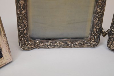 Lot 295 - Edward VII silver mounted hinged photo frame, and two smaller silver mounted easel photo frames