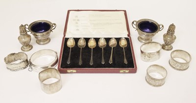 Lot 269 - Silver teaspoons (cased), napkin rings, cruet, etc.