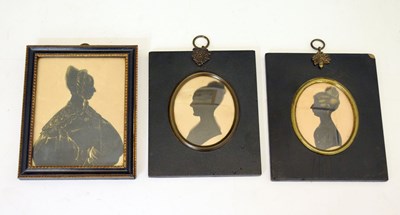 Lot 615 - Three mid 19th century portrait silhouettes of ladies, circa 1840