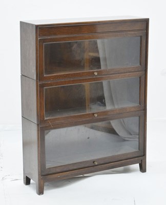 Lot 697 - Globe Wernicke-style oak three section modular bookcase