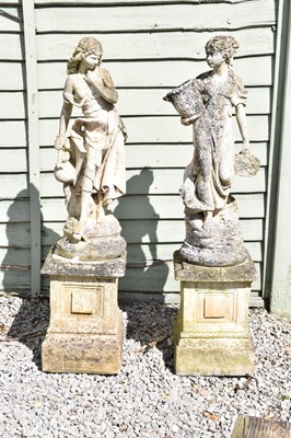 Lot 816 - Two large composition stone garden statues of classical maidens