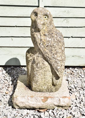 Lot 817 - Composition stone garden ornament of a perched owl