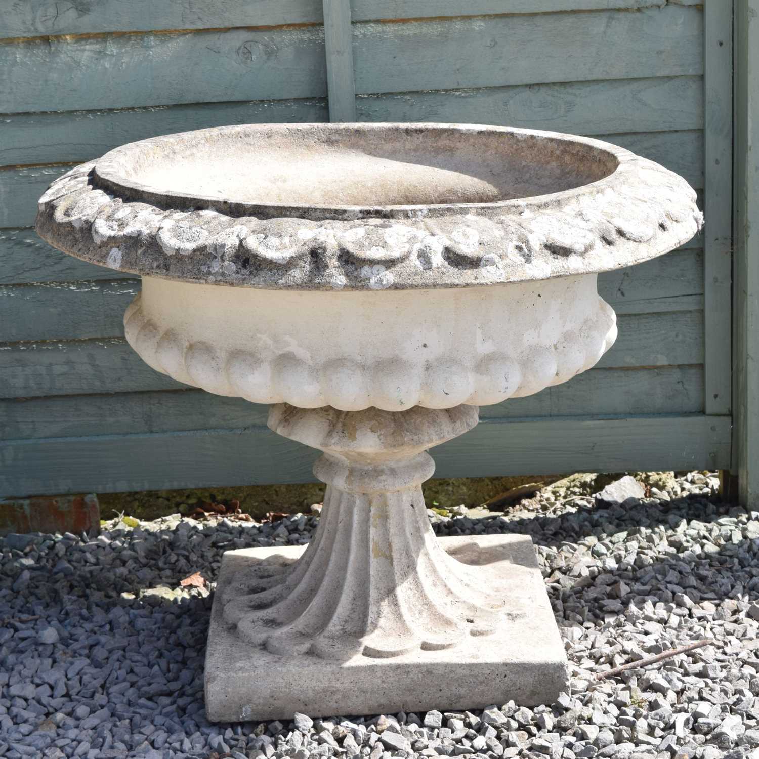 Lot 802 - Composition stone low garden urn / planter