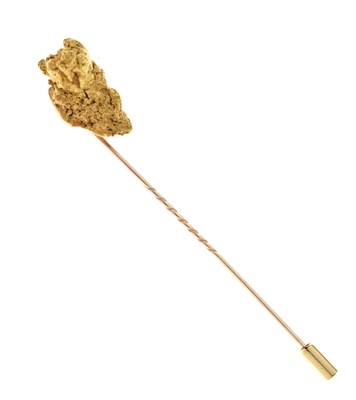 Lot 70 - Early 20th century stick pin, the terminal formed of rough gold nugget