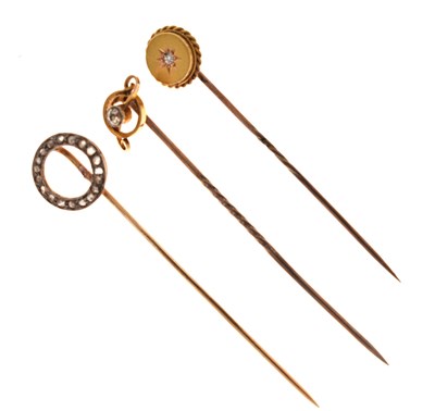 Lot 120 - Three diamond set stickpins