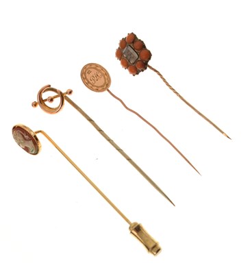 Lot 125 - Four stick pins