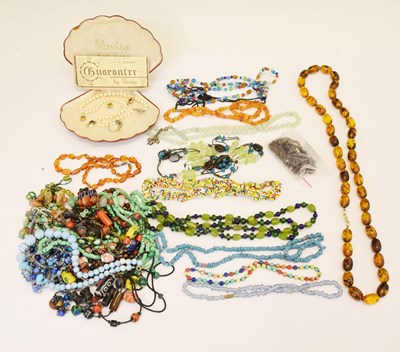 Lot 214 - Costume jewellery to include amber, bone, garnet, hardstone bead necklaces and cased simulated pearls etc