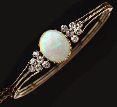 Lot 60 - Edwardian opal and diamond hinged bangle