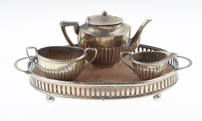 Lot 273 - Silver miniature tea set and gallery tray, Chester