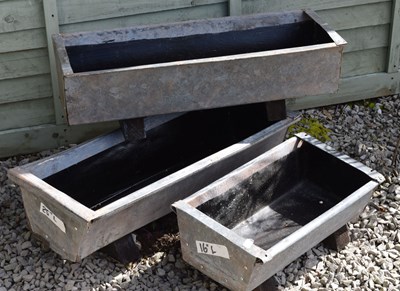 Lot 813 - Three galvanised metal garden troughs