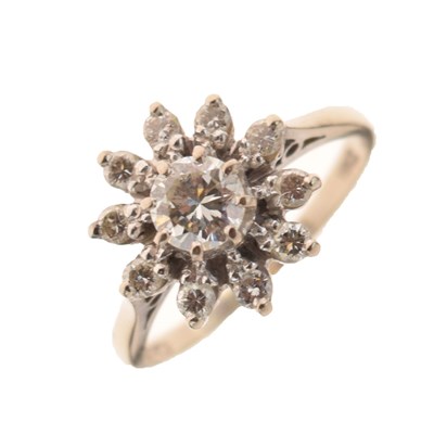 Lot 24 - 18ct white gold diamond flowerhead cluster ring