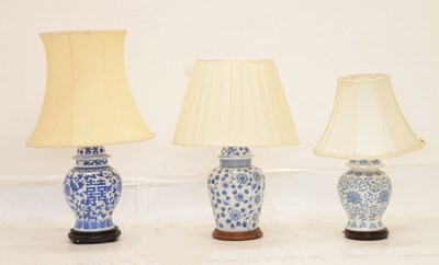 Lot 426 - Three modern Chinese blue and white table lamps