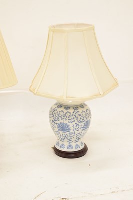 Lot 426 - Three modern Chinese blue and white table lamps